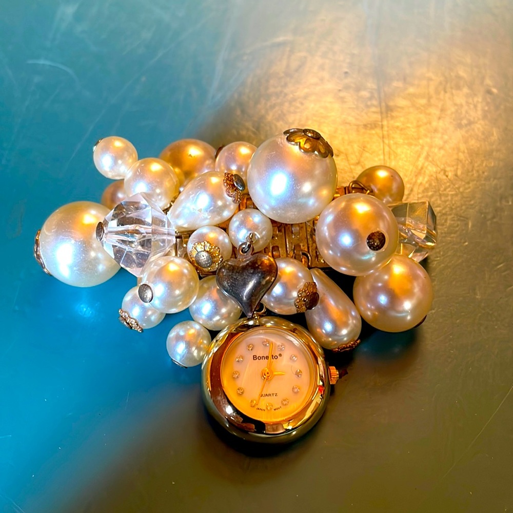 Bonetto watch broach